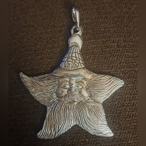 2010 pewter star Santa ornament. Excellent condition.
